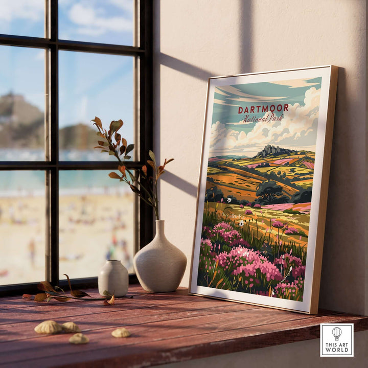 Dartmoor travel print displayed on a shelf, showcasing vibrant landscapes and floral details with a serene background.