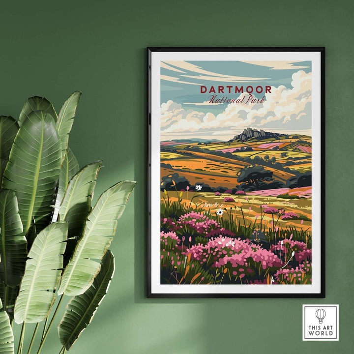 Dartmoor National Park travel print featuring vibrant landscapes and wildflowers, framed on a green wall.