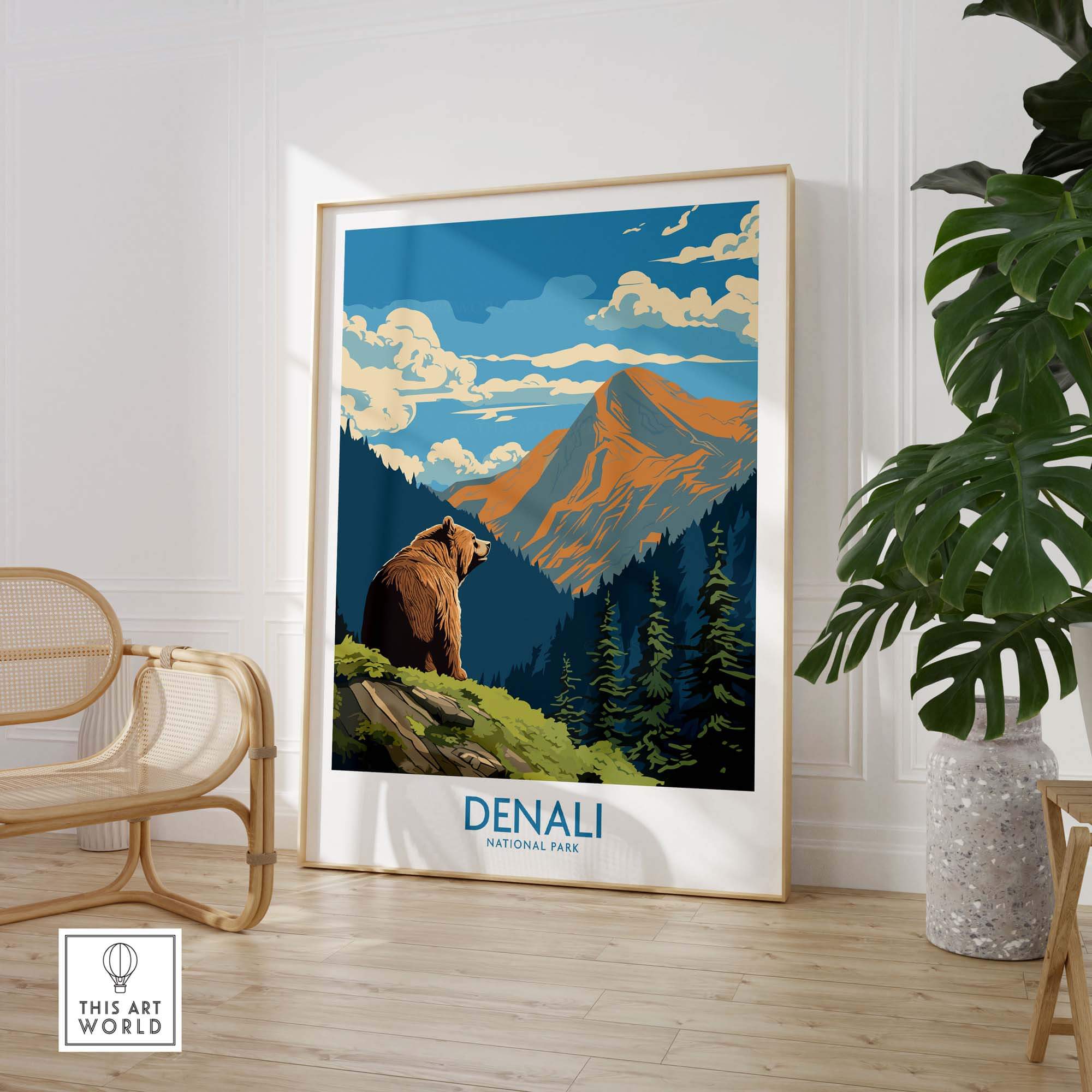 Denali National Park poster featuring a bear, pine trees, and mountains in a modern living room
