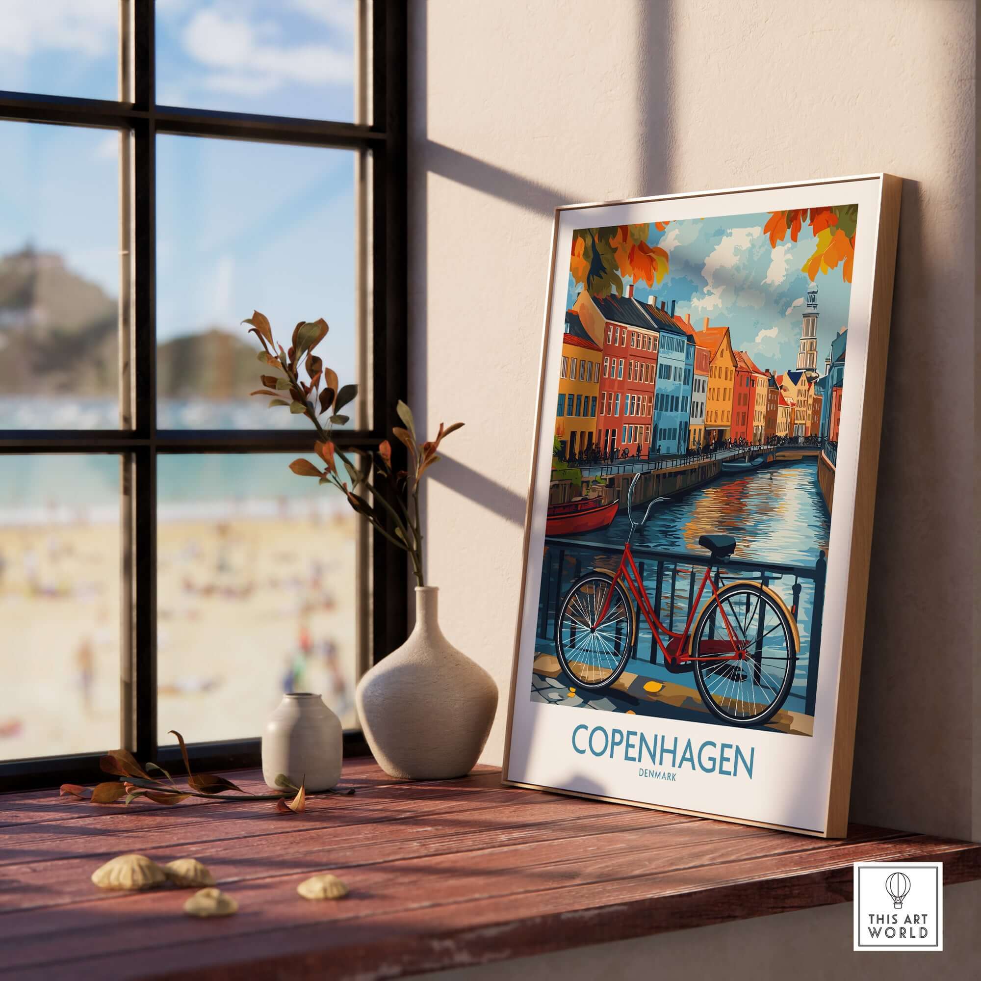 Denmark Copenhagen Fall Poster - Red Bicycle, Colorful Canal Houses Art displayed in a cozy room by a window.