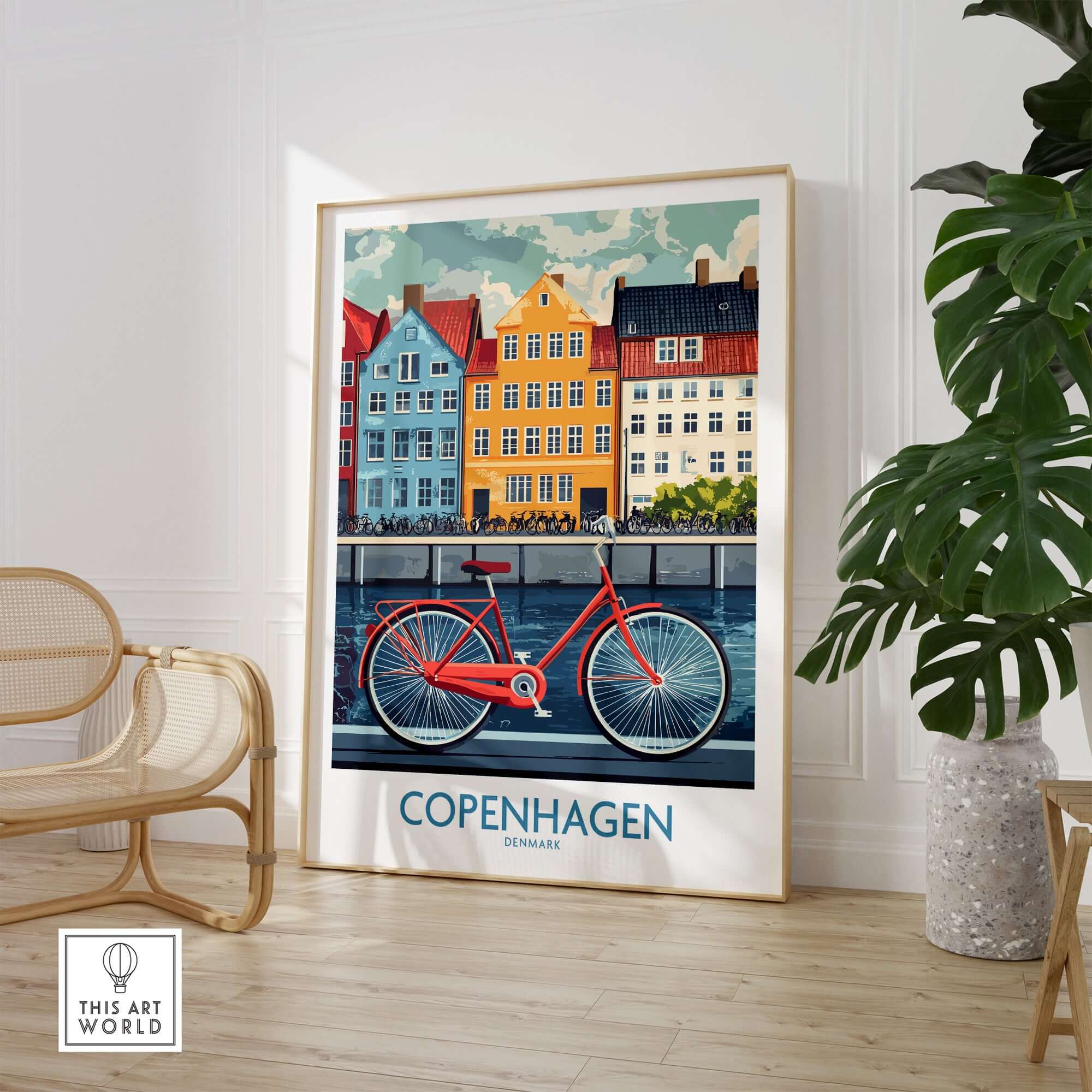 Denmark Copenhagen Poster - Red Bike, Colorful Canal Houses Art displayed in a modern living space with greenery.