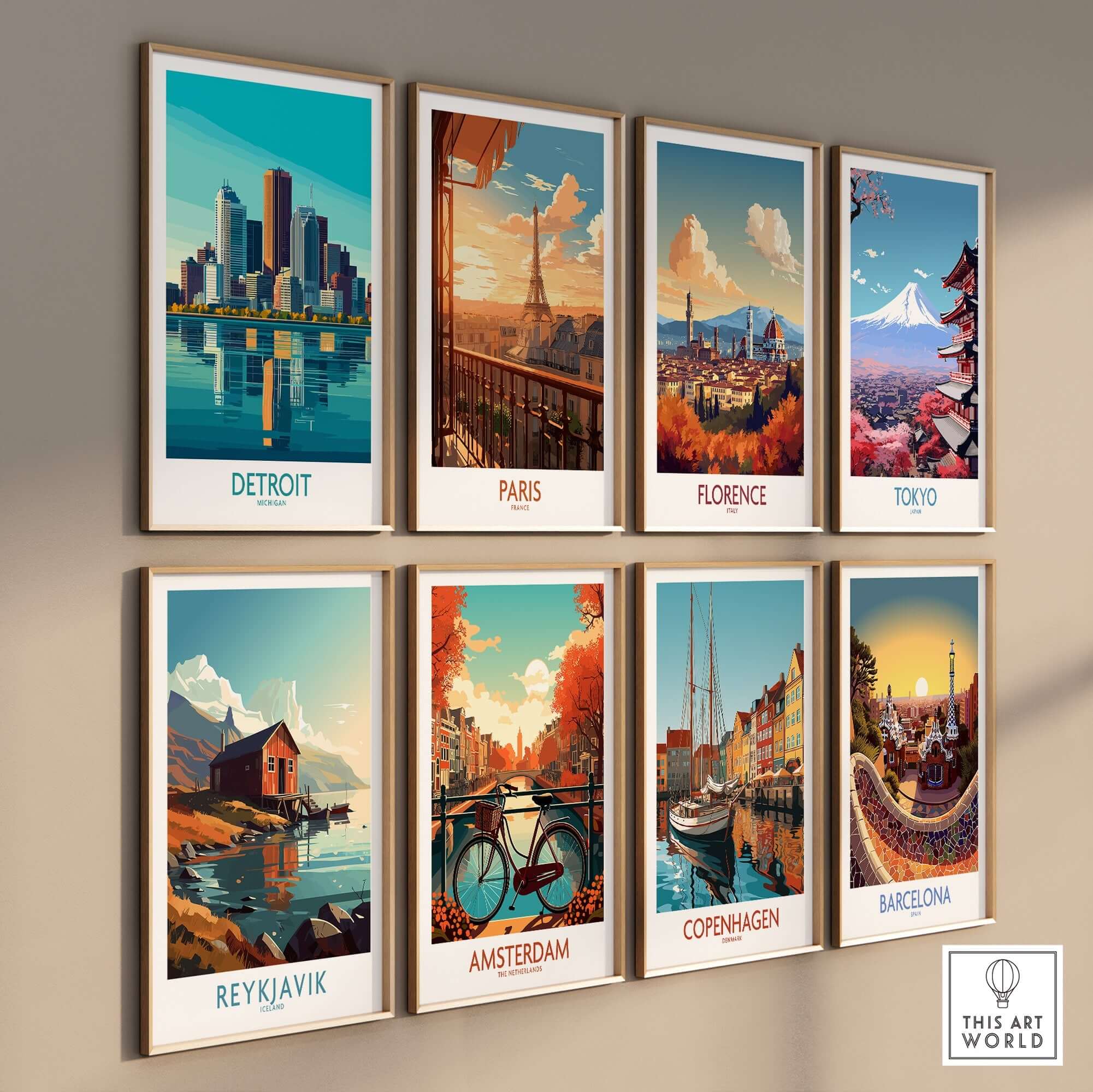 Colorful prints of iconic cities including Detroit Art Print framed on a wall.