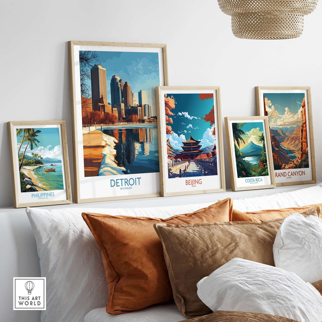 Collection of framed city posters including Detroit, Beijing, Philippines, and Grand Canyon displayed on a cozy sofa.