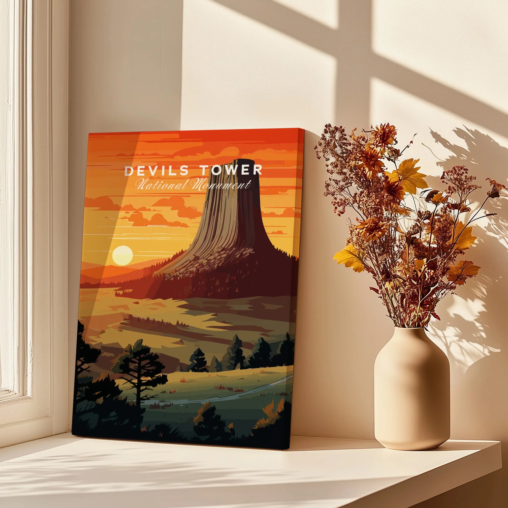 Devils Tower National Monument art print in a sunlit room with vase of dried flowers