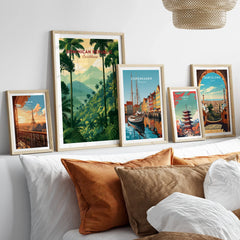 Framed travel posters of Paris, Dominican Republic, Copenhagen, Tokyo, and Barcelona for wall art decor