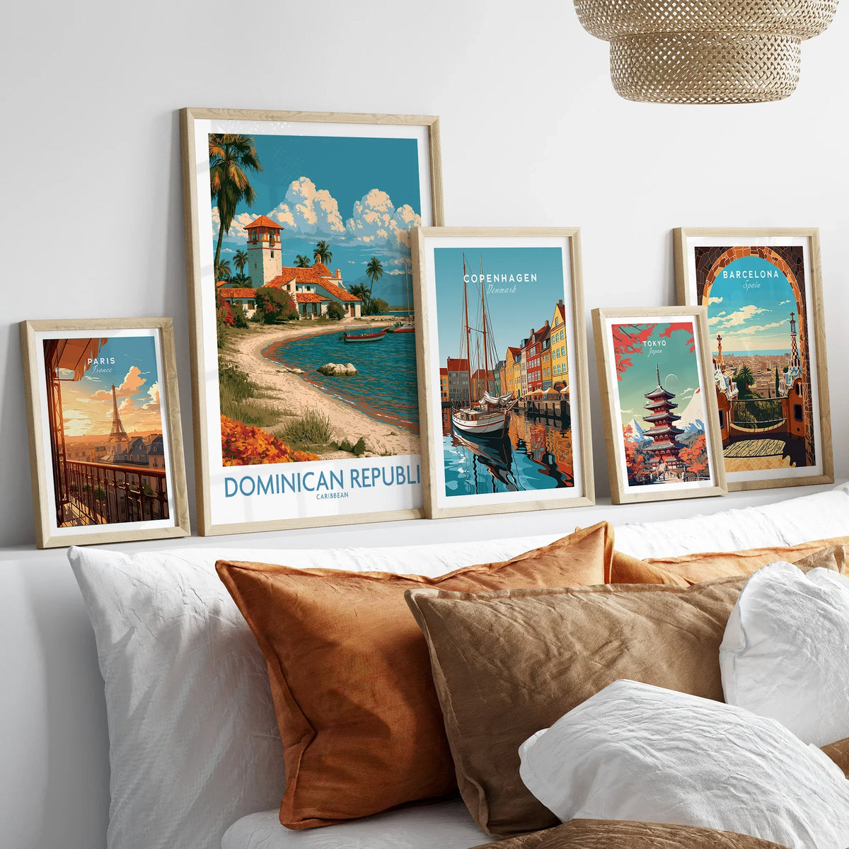 Framed travel posters of Paris, Dominican Republic, Copenhagen, Tokyo, and Barcelona for wall art decor