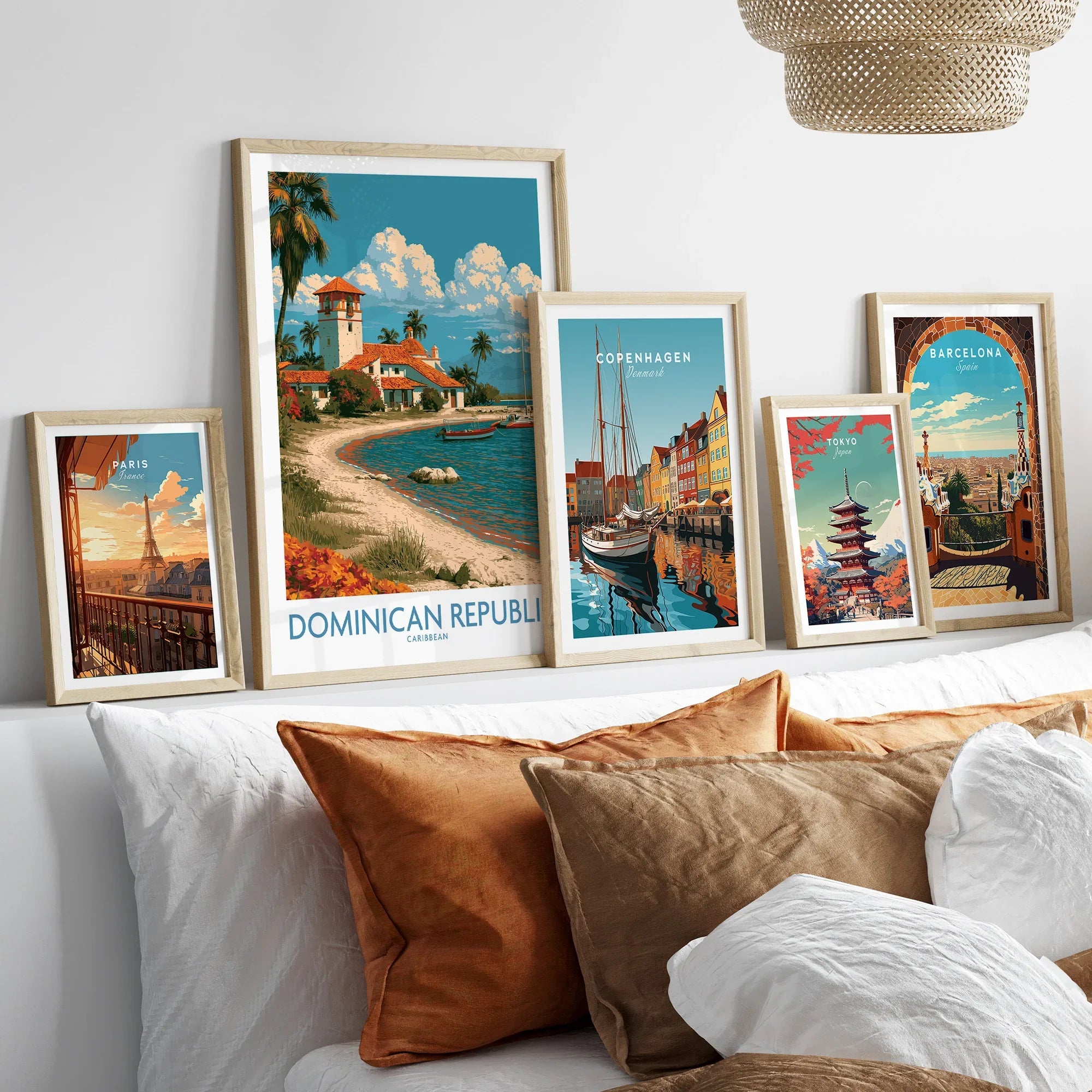 Framed travel posters of Paris, Dominican Republic, Copenhagen, Tokyo, and Barcelona for wall art decor
