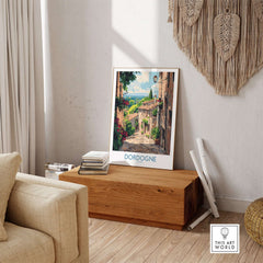 Dordogne Travel Poster displayed in a cozy living room, showcasing the beauty of the Dordogne region.