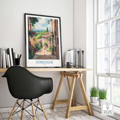 Dordogne Travel Poster displayed in a bright room with modern decor and a cozy workspace.
