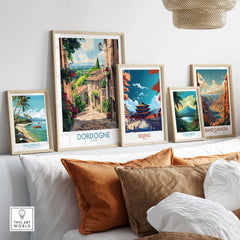 Dordogne Travel Poster displayed among other travel posters in a stylish home decor setting.