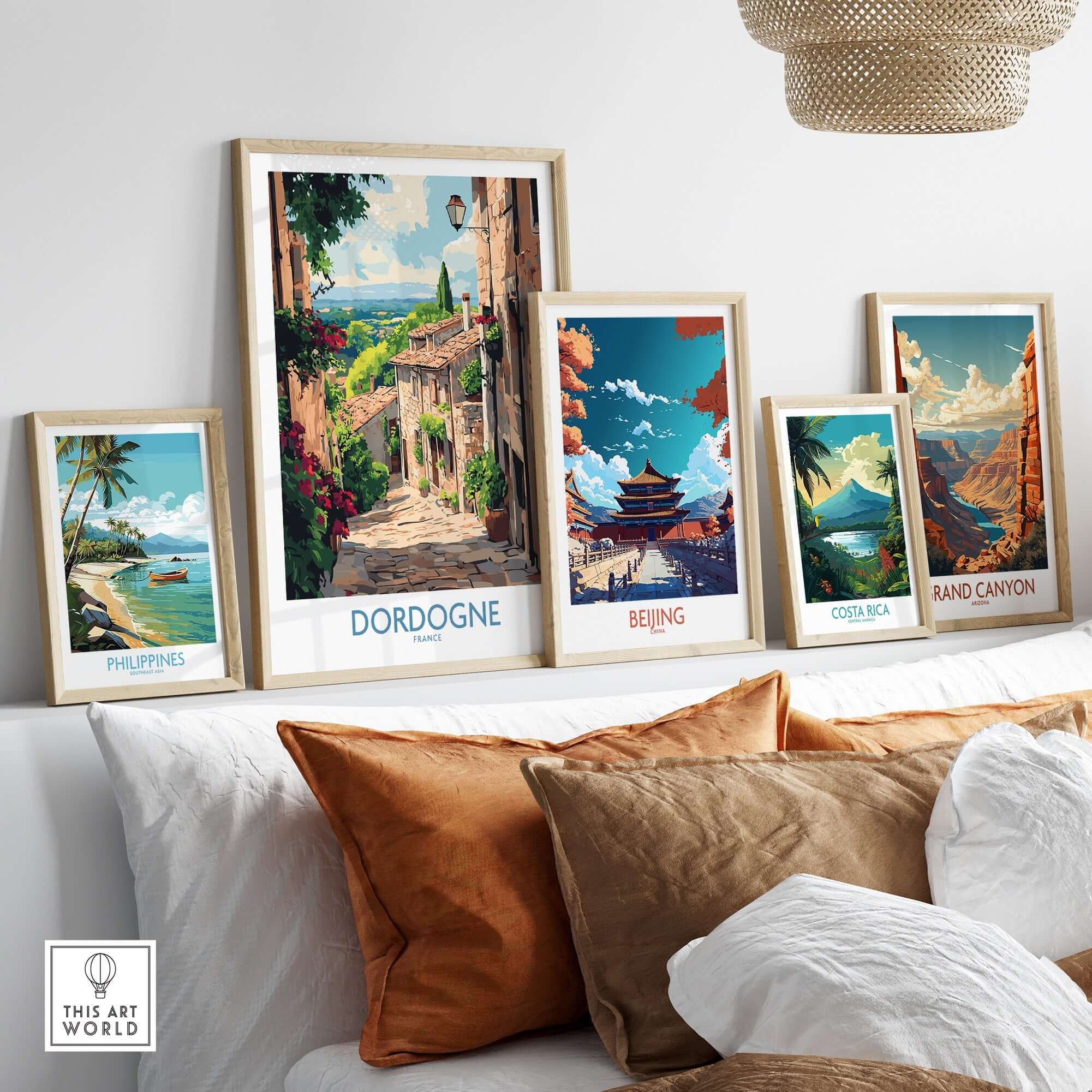 Dordogne Travel Poster displayed among other travel posters in a stylish home decor setting.