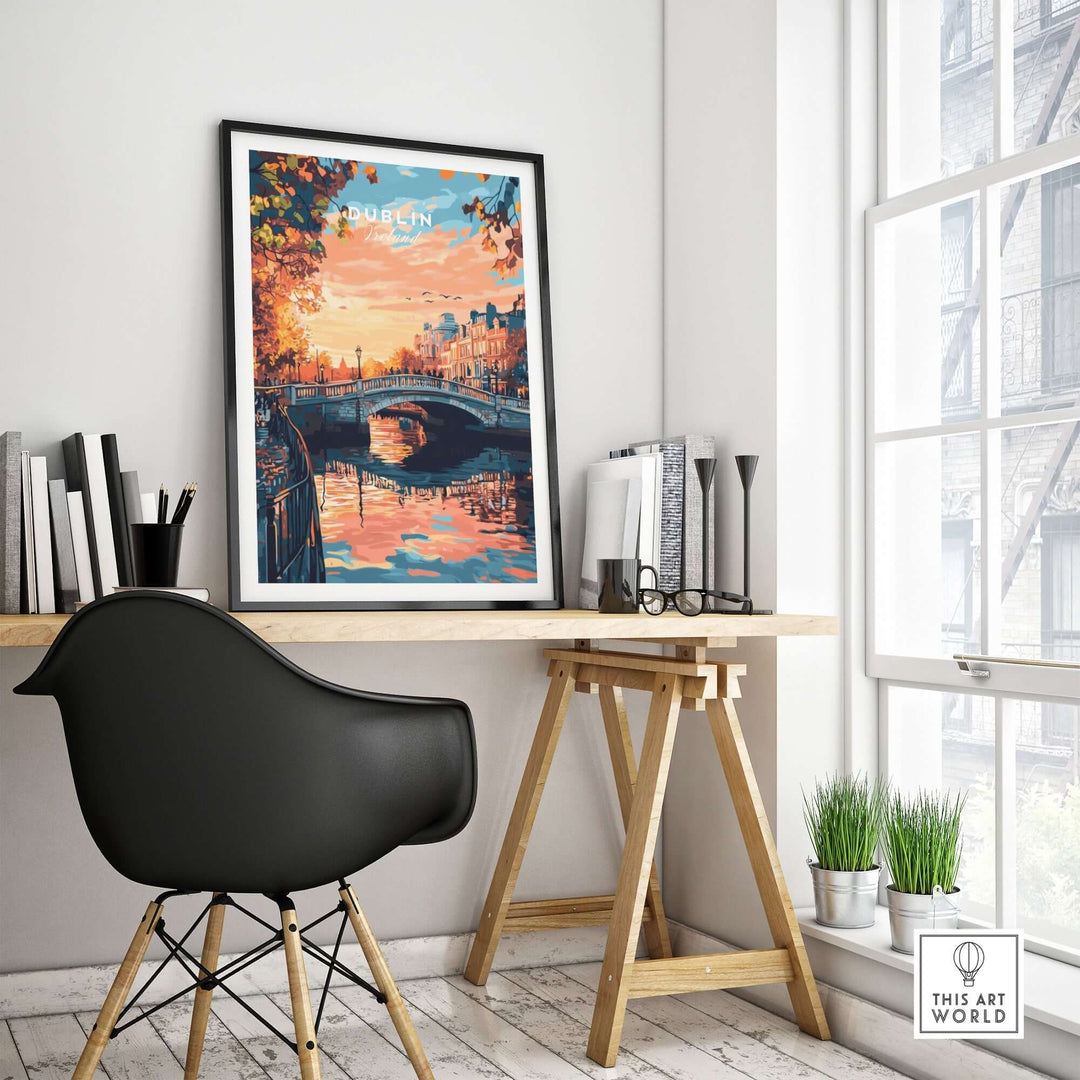 Dublin art print displayed in a bright room with a wooden desk and chair, highlighting a scenic view of the river at sunset.