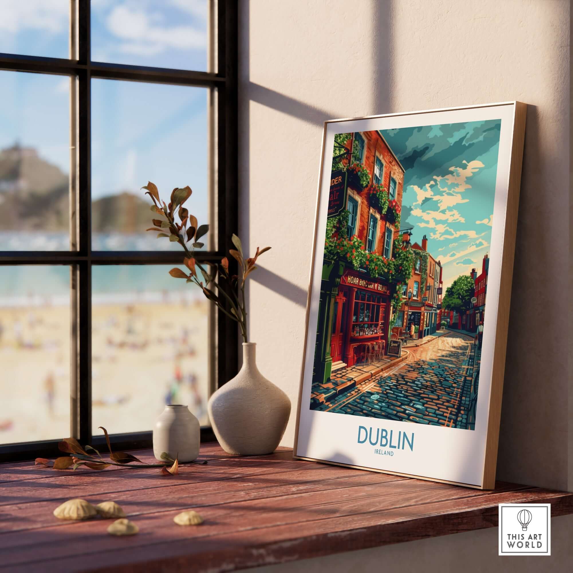 Dublin Ireland Print showcasing Dublin's vibrant streets, framed and displayed on a windowsill with decorative elements.