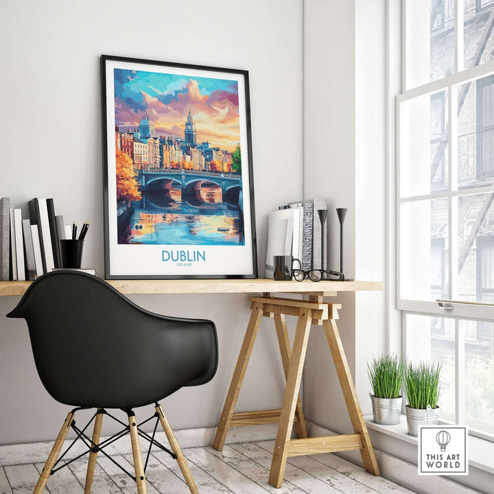 Dublin travel poster displayed in a modern workspace with a black chair and plants, showcasing vibrant cityscape artwork.