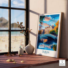 Dublin Wall Art displayed on a wooden table, featuring a vibrant cityscape with a bridge and colorful buildings.