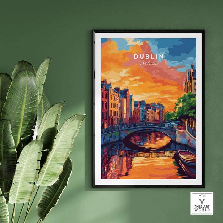 Colorful Dublin wall art print featuring a sunset over a canal and iconic buildings, framed against a green wall.