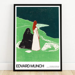 Framed Edvard Munch art print with two women on a green shoreline, modern wall decor.