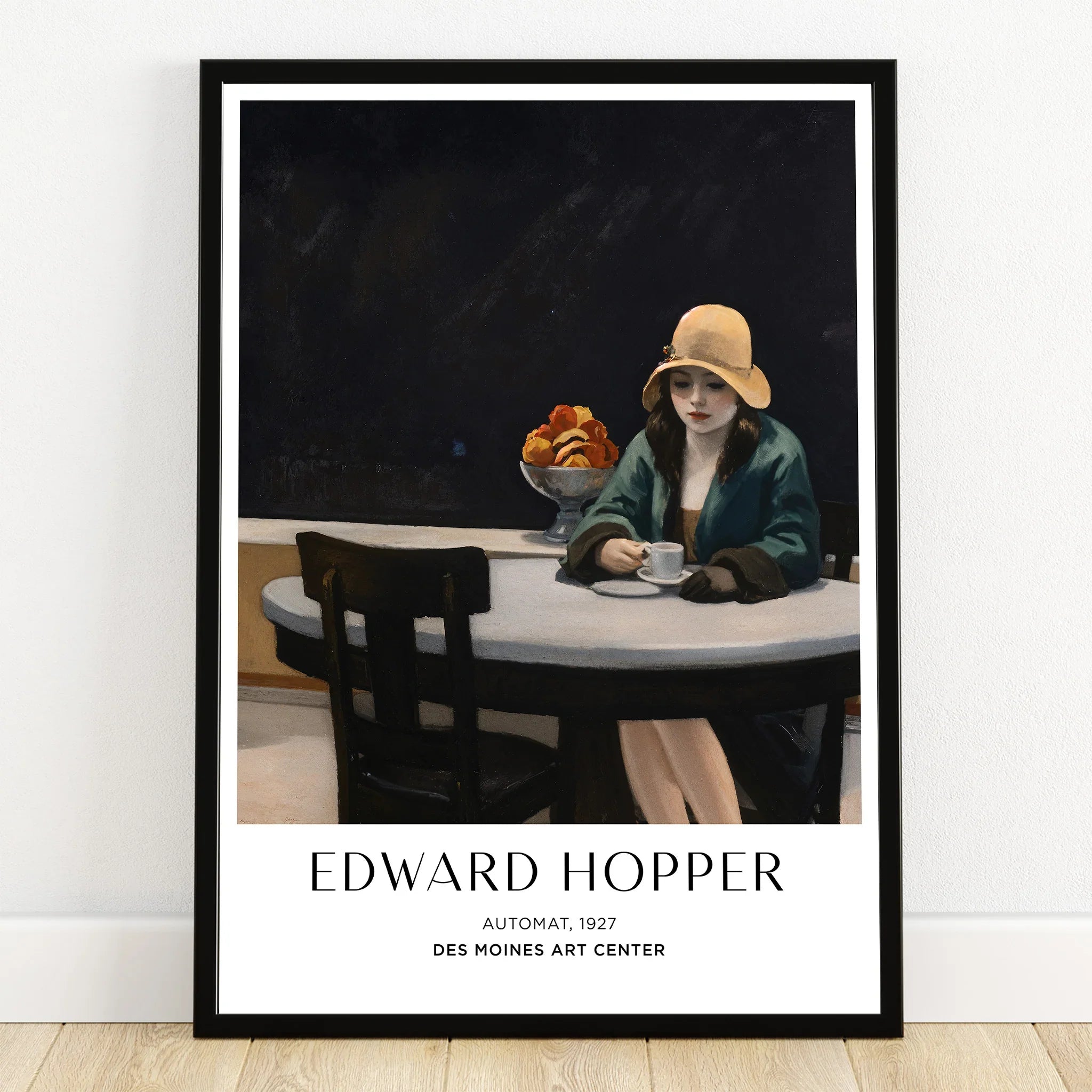 Framed Edward Hopper art print featuring a woman in a café with a cup, stylish wall decor