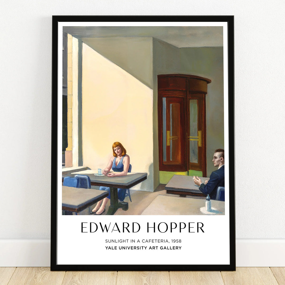 Framed Edward Hopper art print featuring 'Sunlight in a Cafeteria' with two people sitting indoors.