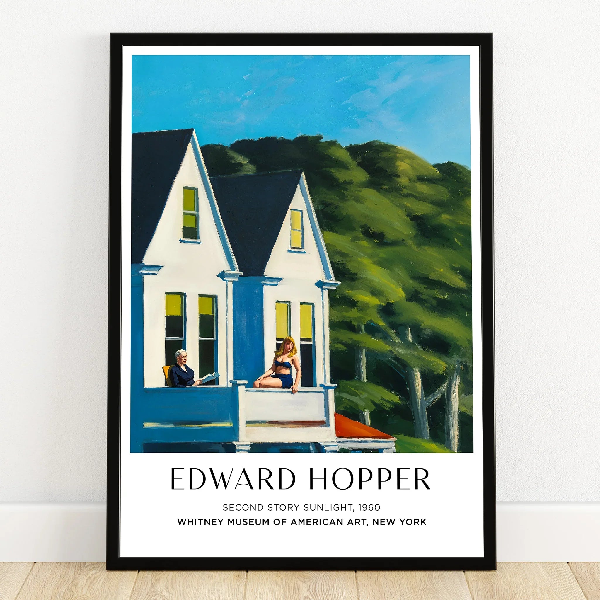 Framed poster of Edward Hopper's Second Story Sunlight, showing two women on a sunlit balcony.