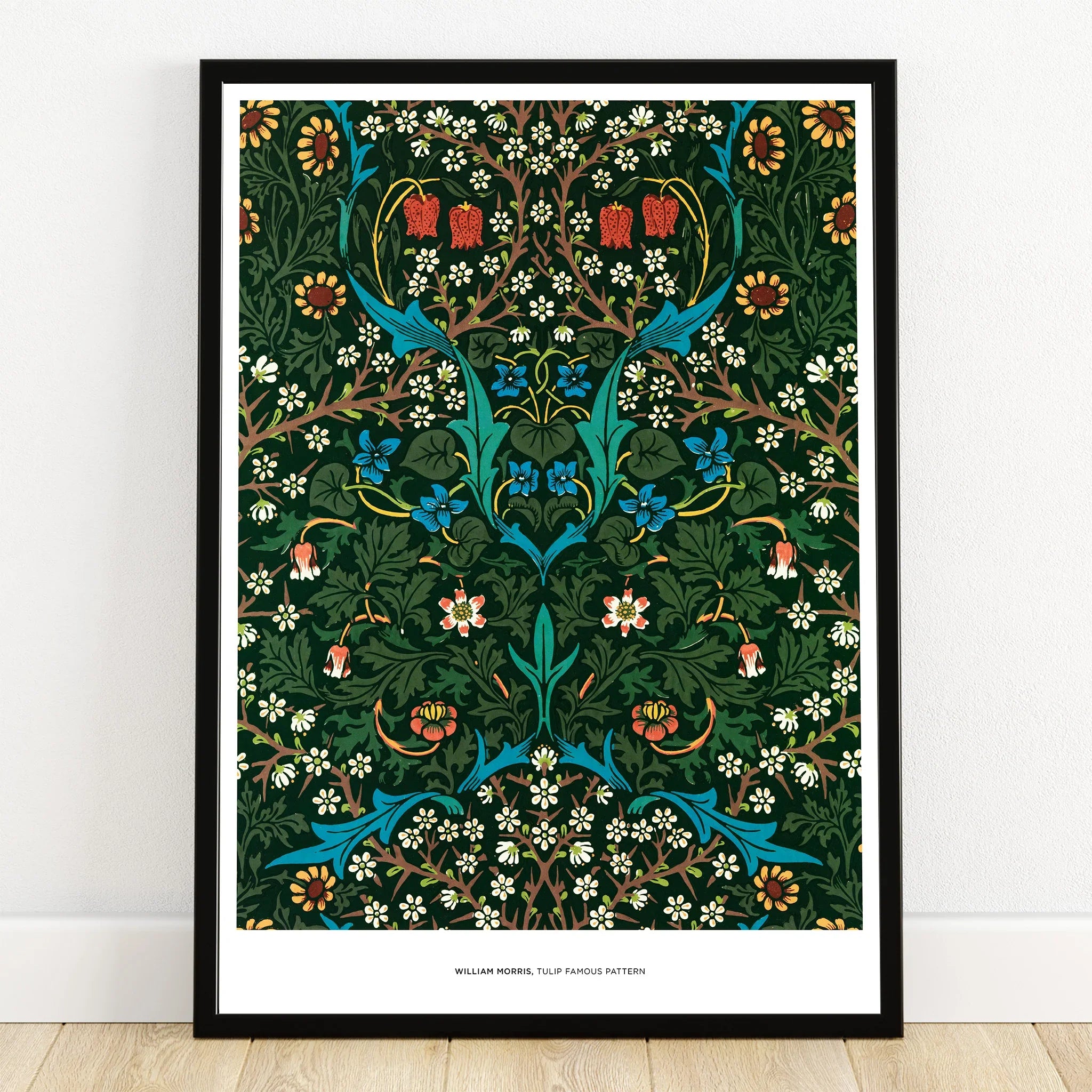 Framed William Morris floral wall art print with green, red, blue, and yellow botanical pattern