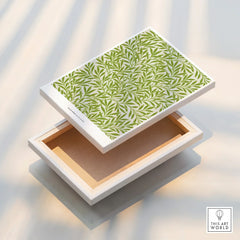 Floating stretched canvas wall art with green leafy pattern under natural light