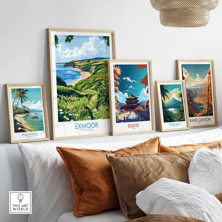 Exmoor National Park travel print among framed travel art prints on a stylish shelf, showcasing stunning landscapes and vibrant colors.