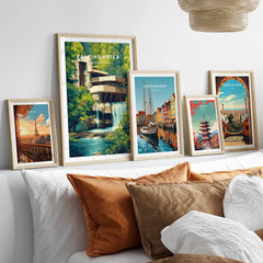 Framed travel posters of Paris, Fallingwater, Copenhagen, Tokyo, and Barcelona for wall art decor