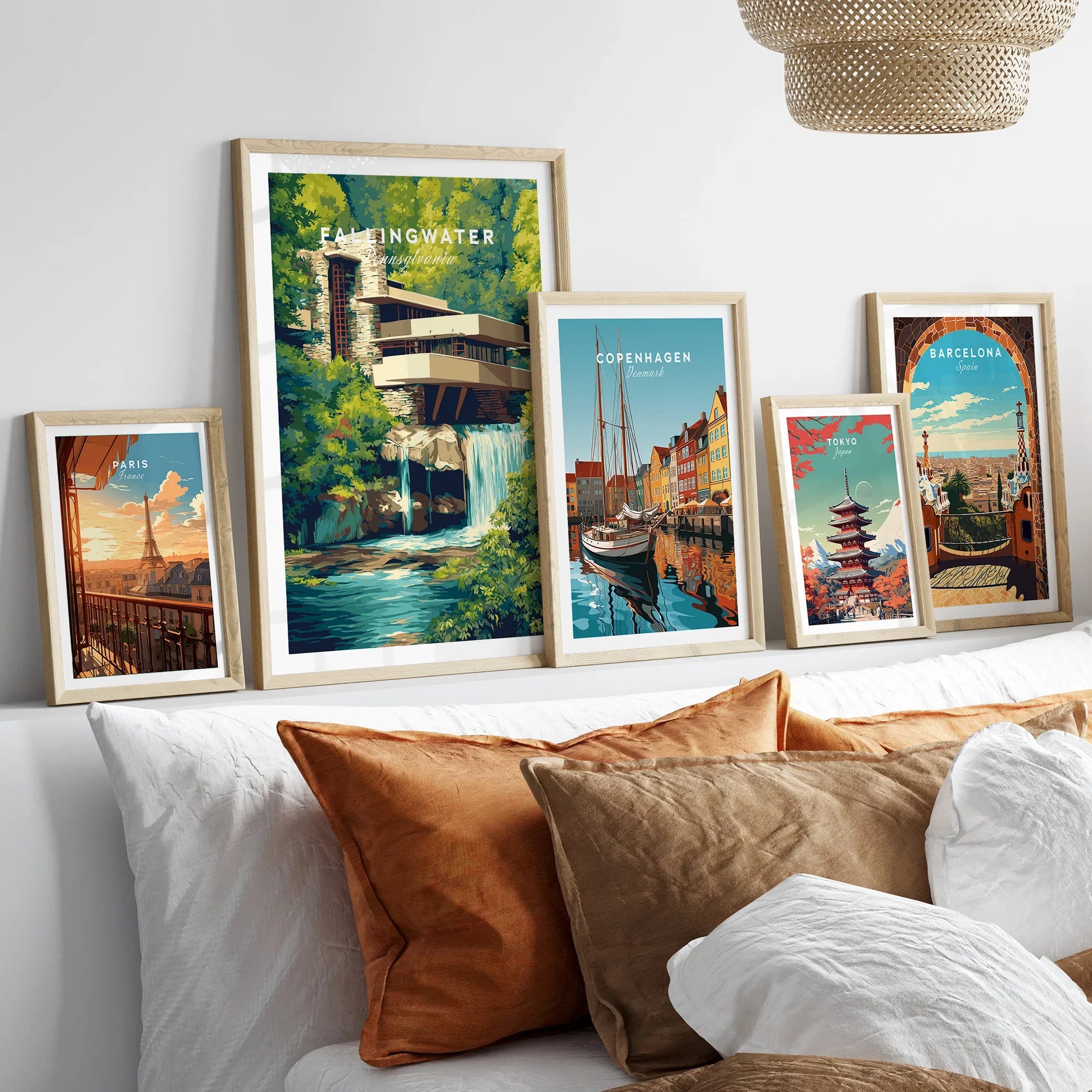 Framed travel posters of Paris, Fallingwater, Copenhagen, Tokyo, and Barcelona for wall art decor