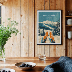 Falls Creek Wall Art ski poster showcasing a snowy mountain landscape and skis, enhancing home decor.