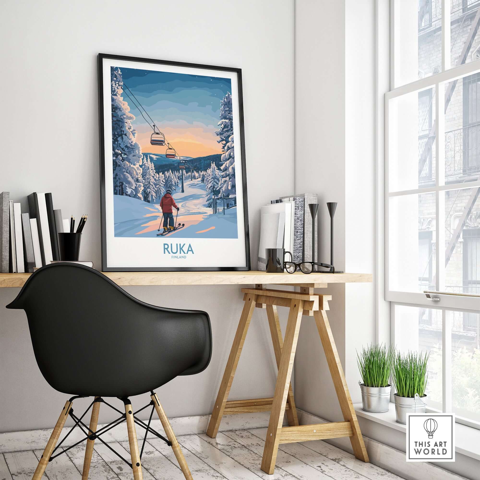 Framed Ruka snow scene print in a modern office, showcasing Scandinavian winter decor and a cozy atmosphere.