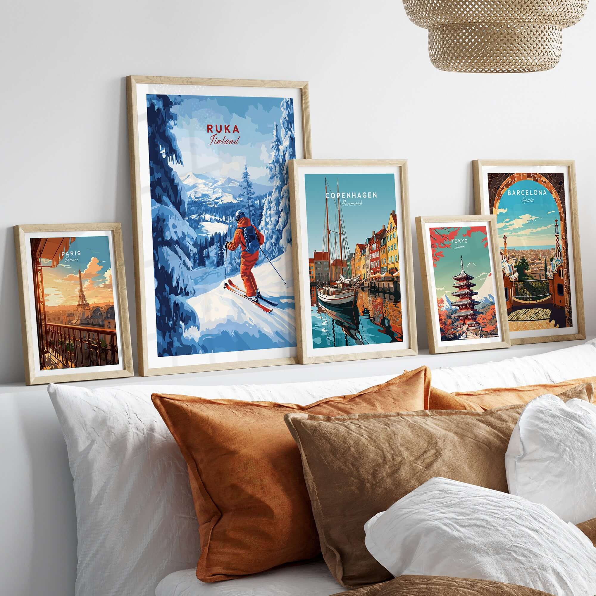 Ruka ski run poster showcased among Nordic travel art prints on a stylish living room wall.