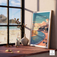 Côte d'Azur travel poster print displayed in a sunny room, showcasing the French coastline and vibrant colors.