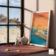 Tenerife Spain travel poster print displayed on a wooden shelf with coastal view, perfect for wall decor.