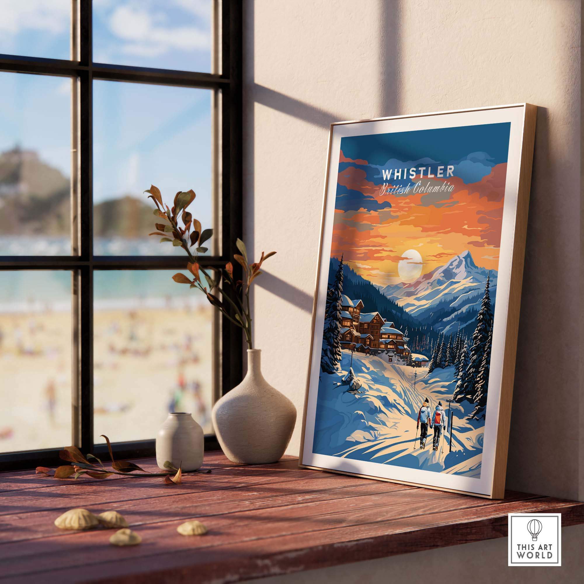 Whistler Ski Resort poster with sunset view displayed on a windowsill, featuring snowy mountains and a cozy chalet scene.