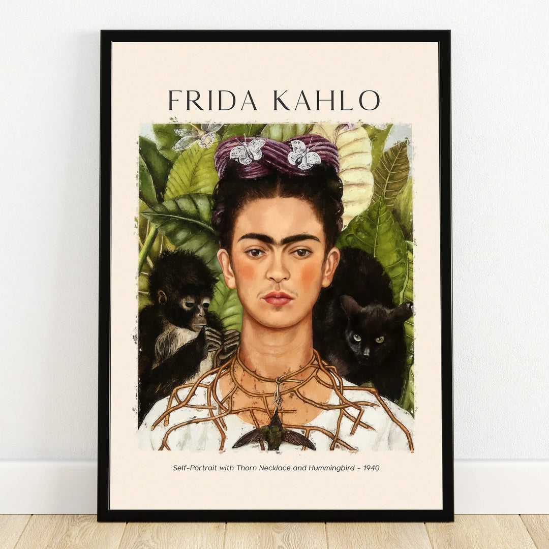 Frida Kahlo wall art print in black frame, portrait with monkey, cat, and botanical leaves