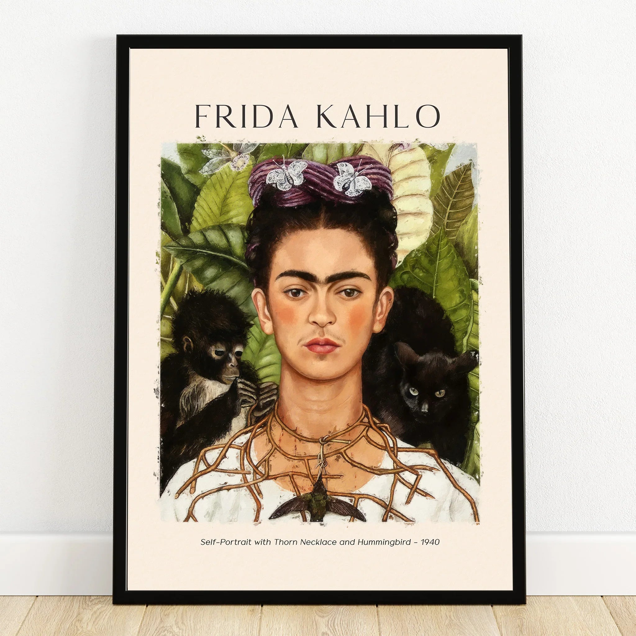 Frida Kahlo wall art print in black frame, portrait with monkey, cat, and botanical leaves