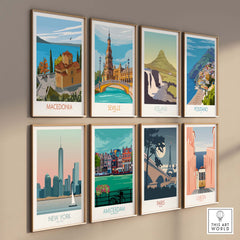 Collection of vibrant wall art prints featuring Macedonia, Seville, Iceland, Positano, New York, Amsterdam, Paris, and Lisbon.