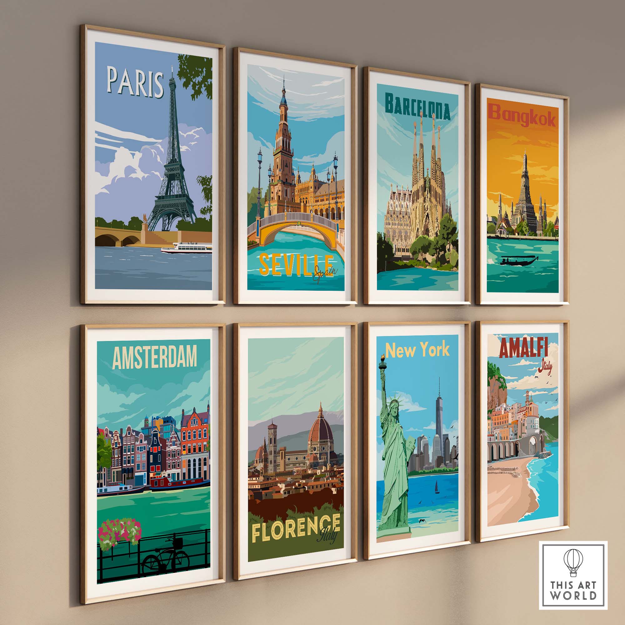 Gallery wall with travel poster prints of Paris, Barcelona, Bangkok, Seville, Amsterdam, Florence, New York, and Amalfi.