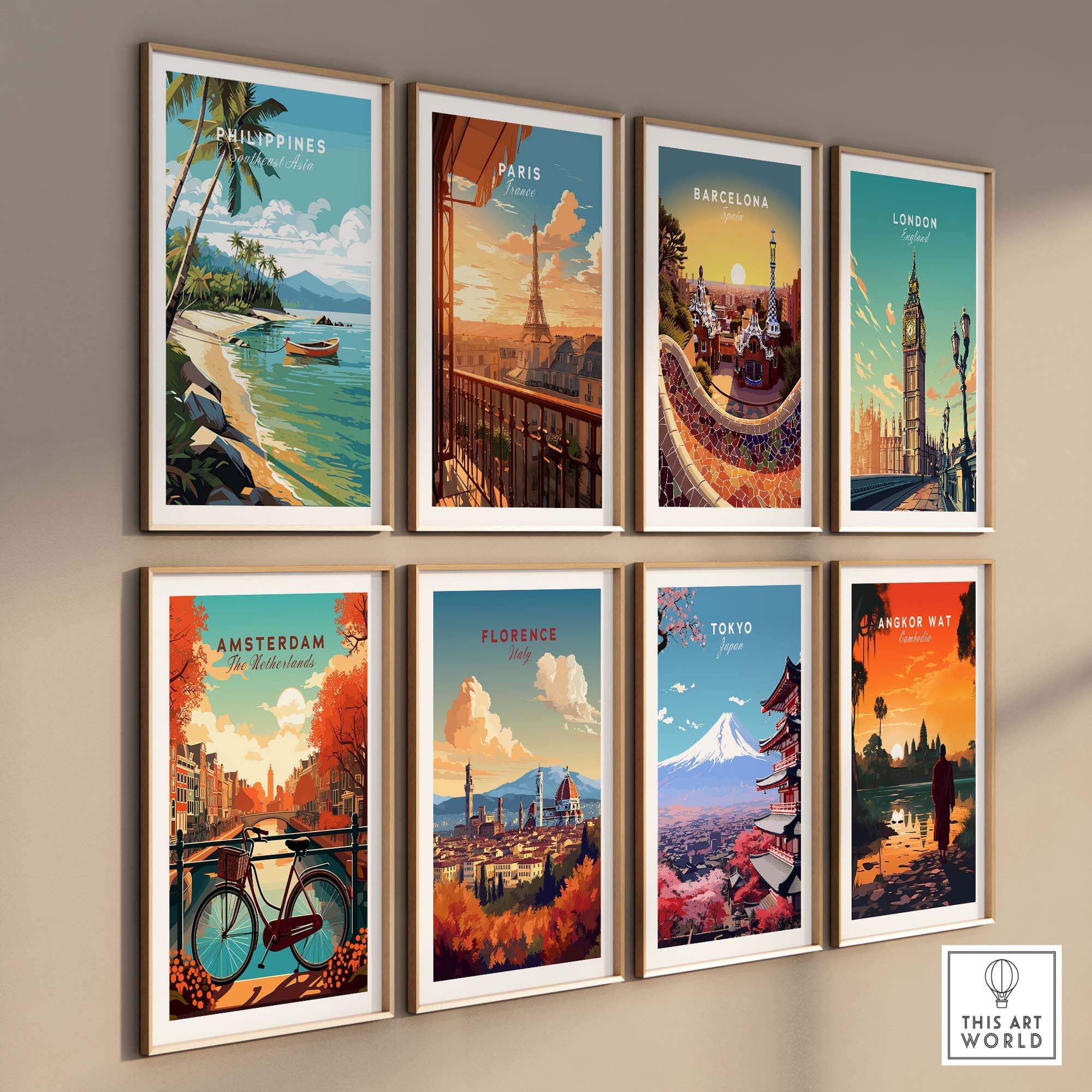 Gallery wall featuring vibrant travel art prints of Philippines, Paris, Barcelona, London, Amsterdam, Florence, Tokyo, and Angkor Wat.