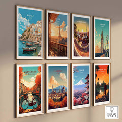 Gallery wall featuring framed travel art prints of cities like Sicily, Paris, Barcelona, and more.