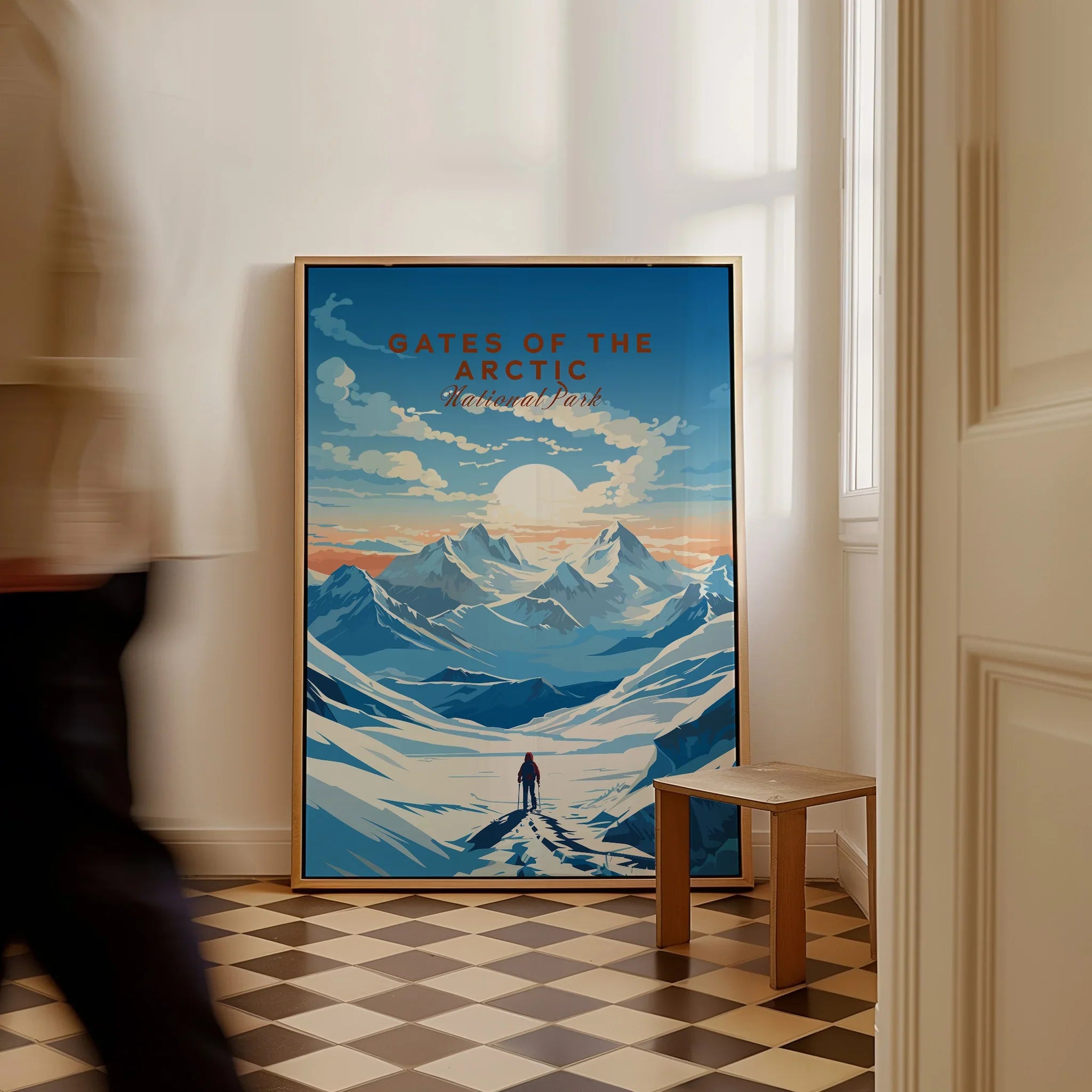 Framed Gates of the Arctic National Park travel poster with mountains in hallway interior.