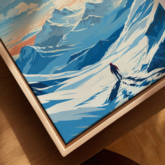 Close-up of framed canvas wall art showing hiker in snowy mountain landscape, travel poster style