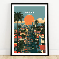 Ghana Coastal Sunset Travel Poster — art print in black frame on wooden floor