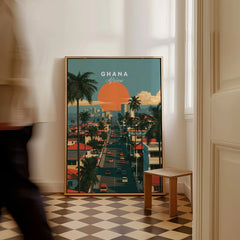 Ghana Coastal Sunset Travel Poster — framed canvas on floor man walking past