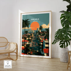 Ghana Coastal Sunset Travel Poster — large framed print room setting chair plant