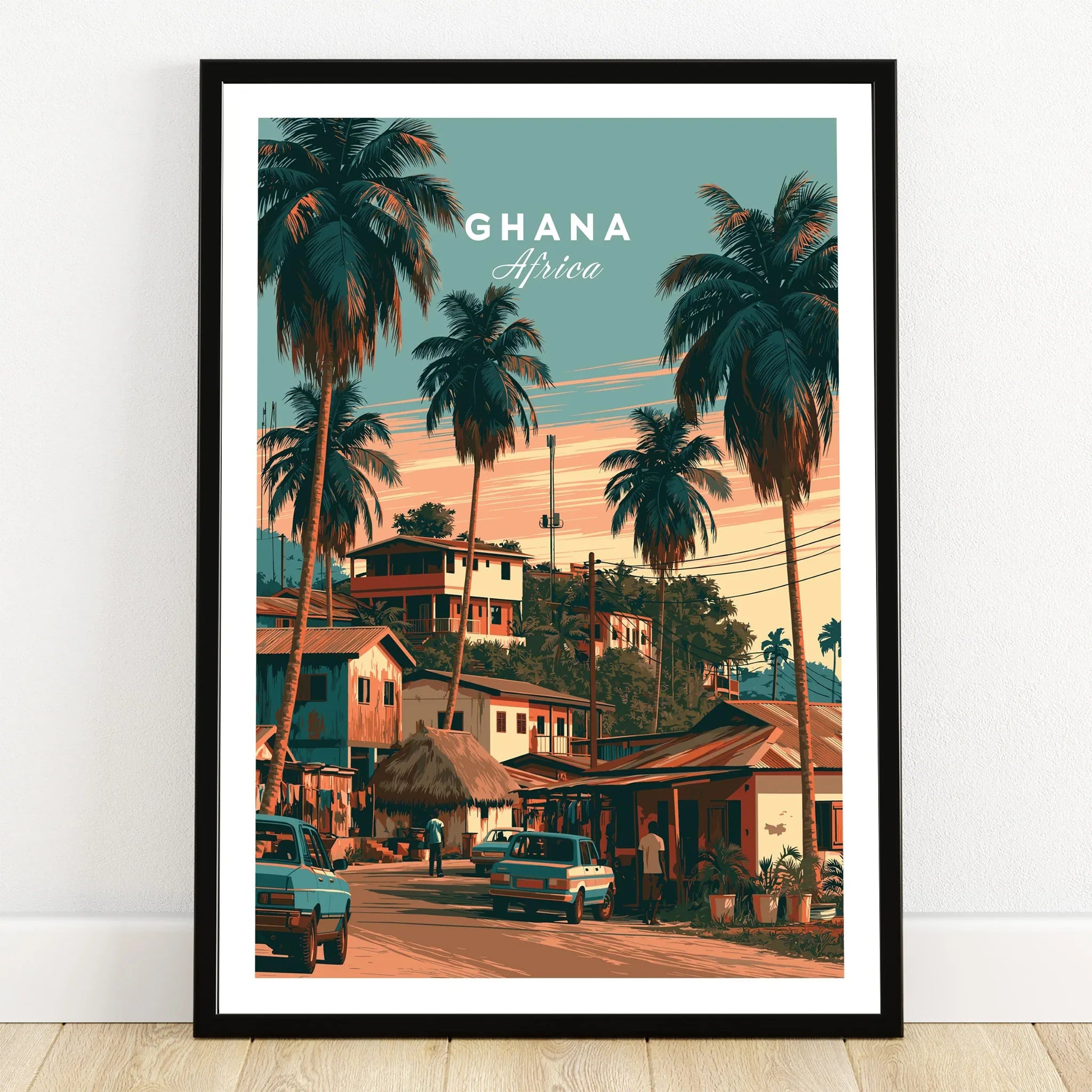 Ghana Village Street Travel Poster — art print in black frame on wooden floor
