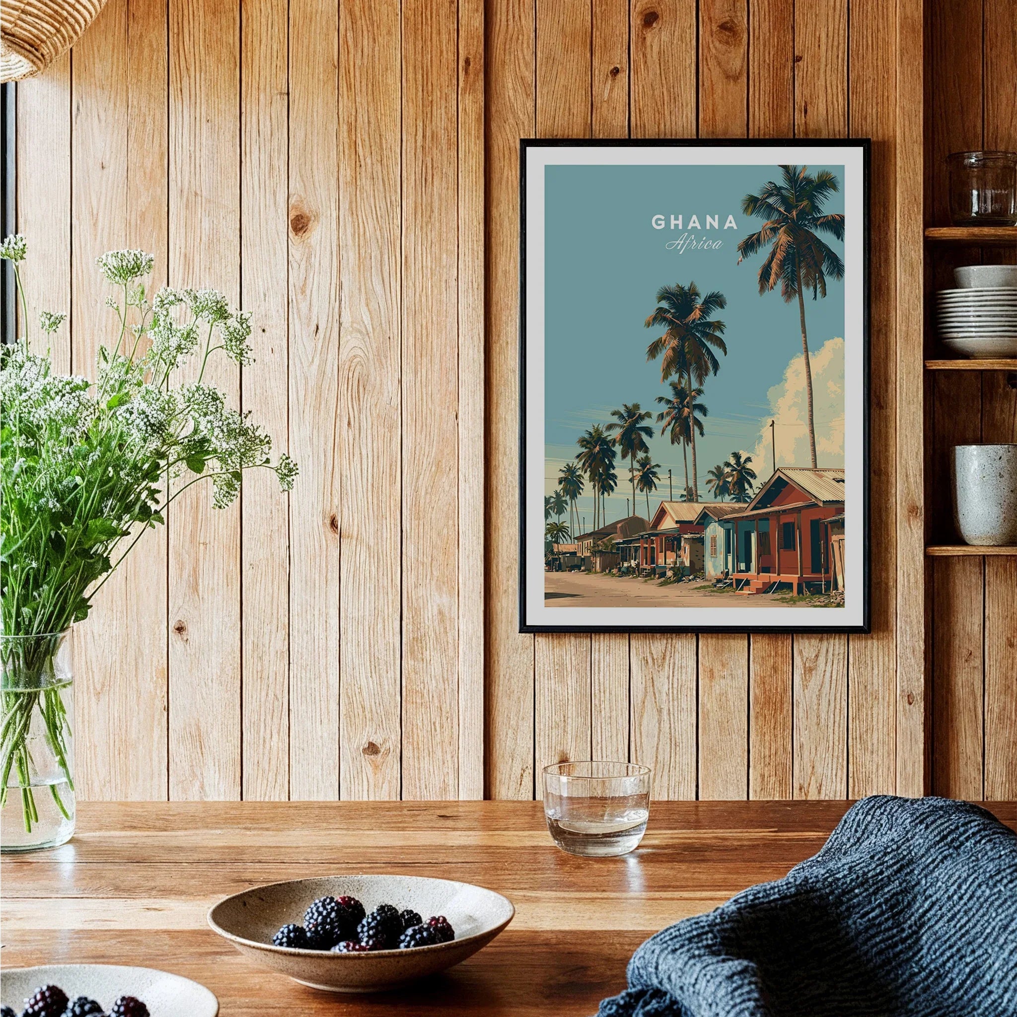 Ghana Coastal Village Travel Poster — black framed art print kitchen setting