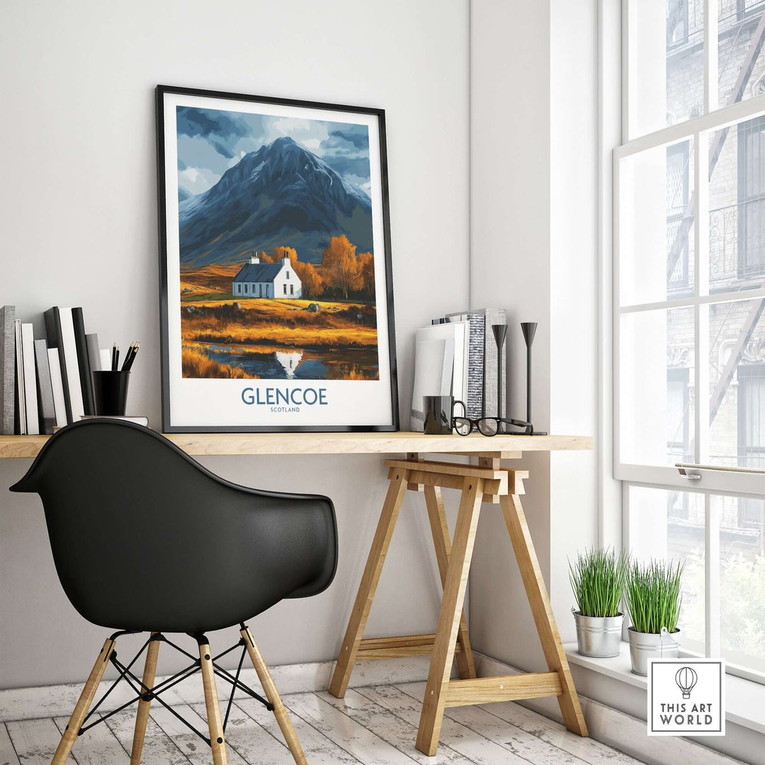 Glencoe Scotland print displayed in a stylish workspace with a black chair and modern decor.