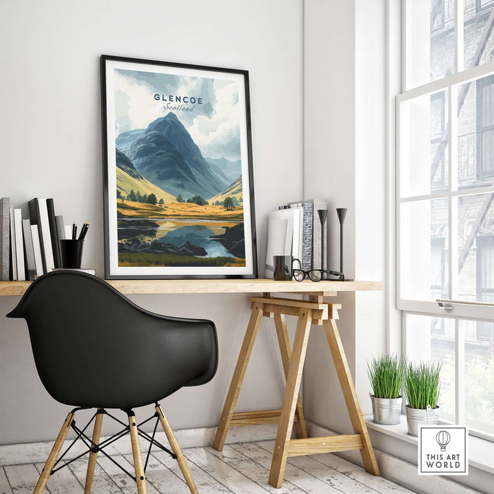 Glencoe Travel Print displayed in a cozy workspace, showcasing Scotland's breathtaking landscapes and natural beauty.